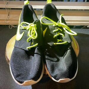 Black and neon green Nike
